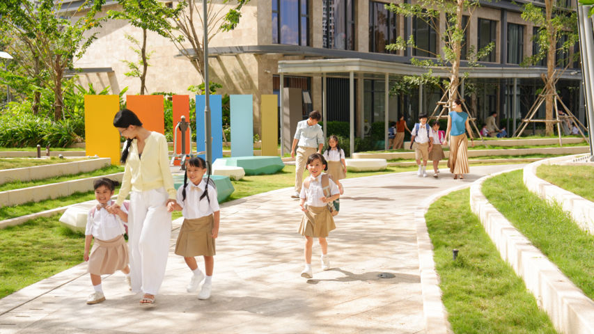 A group of people walking on a sidewalkAI-generated content may be incorrect.